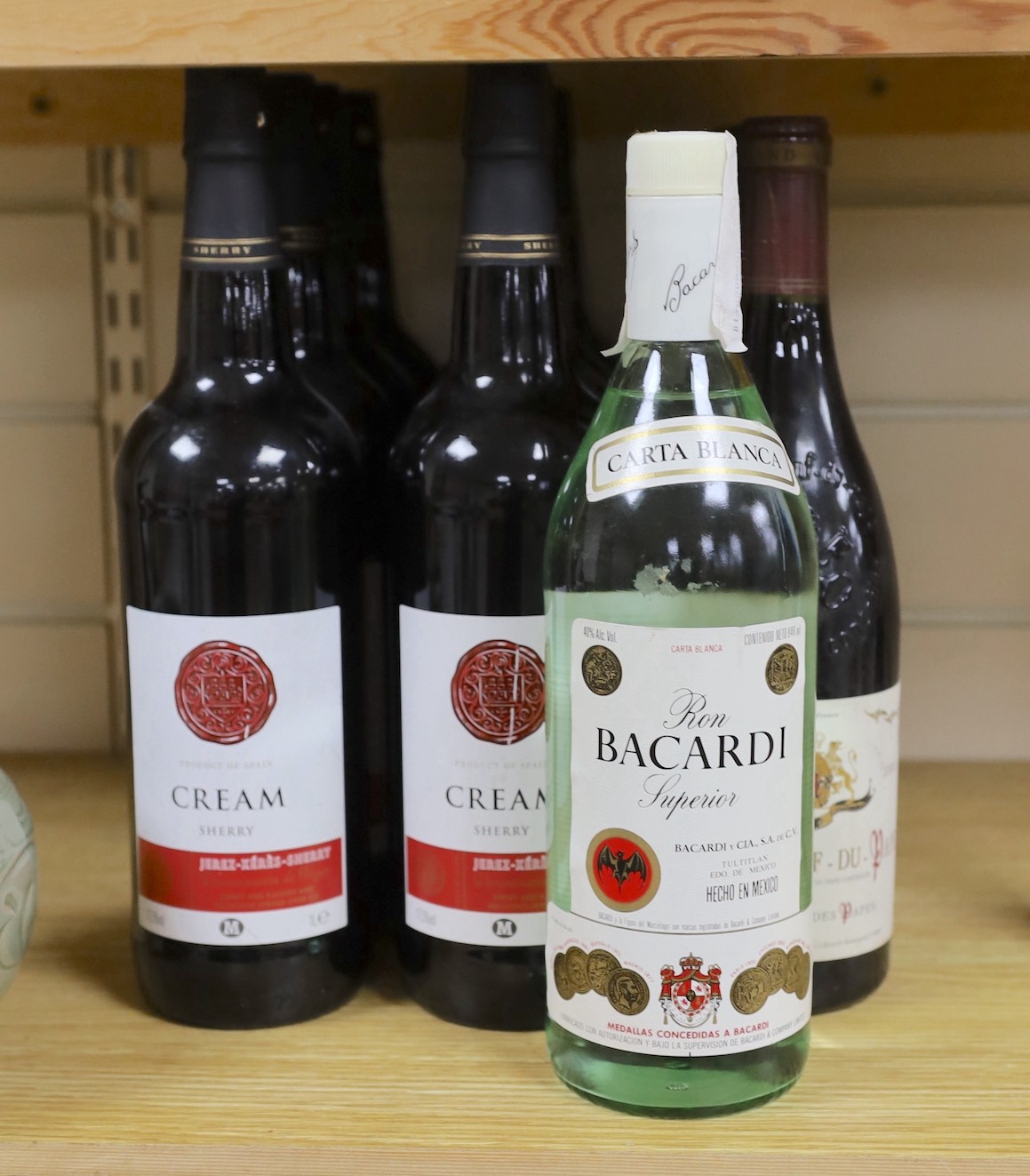 Eight bottles of Cream sherry, together with four bottles of Chateauneuf-du-Pape and a bottle of Barcadi (13)